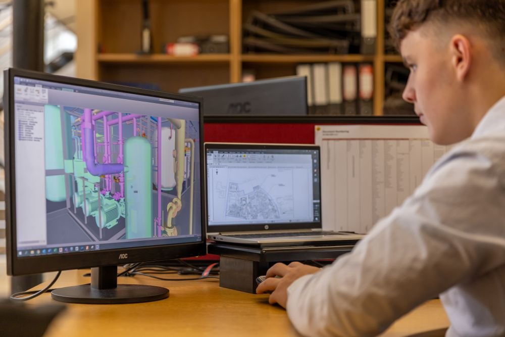 Engineer working on CAD drawings