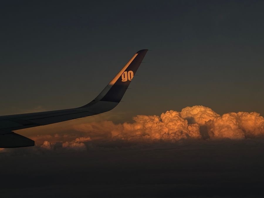 Aircraft wing at sunset